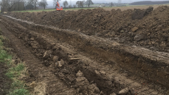 The dug out track and the ripped centre trench where the 150 coil pipe was laid and backfilled with gravel