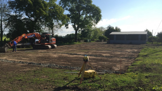 Clearing the site and laser levelling the ground